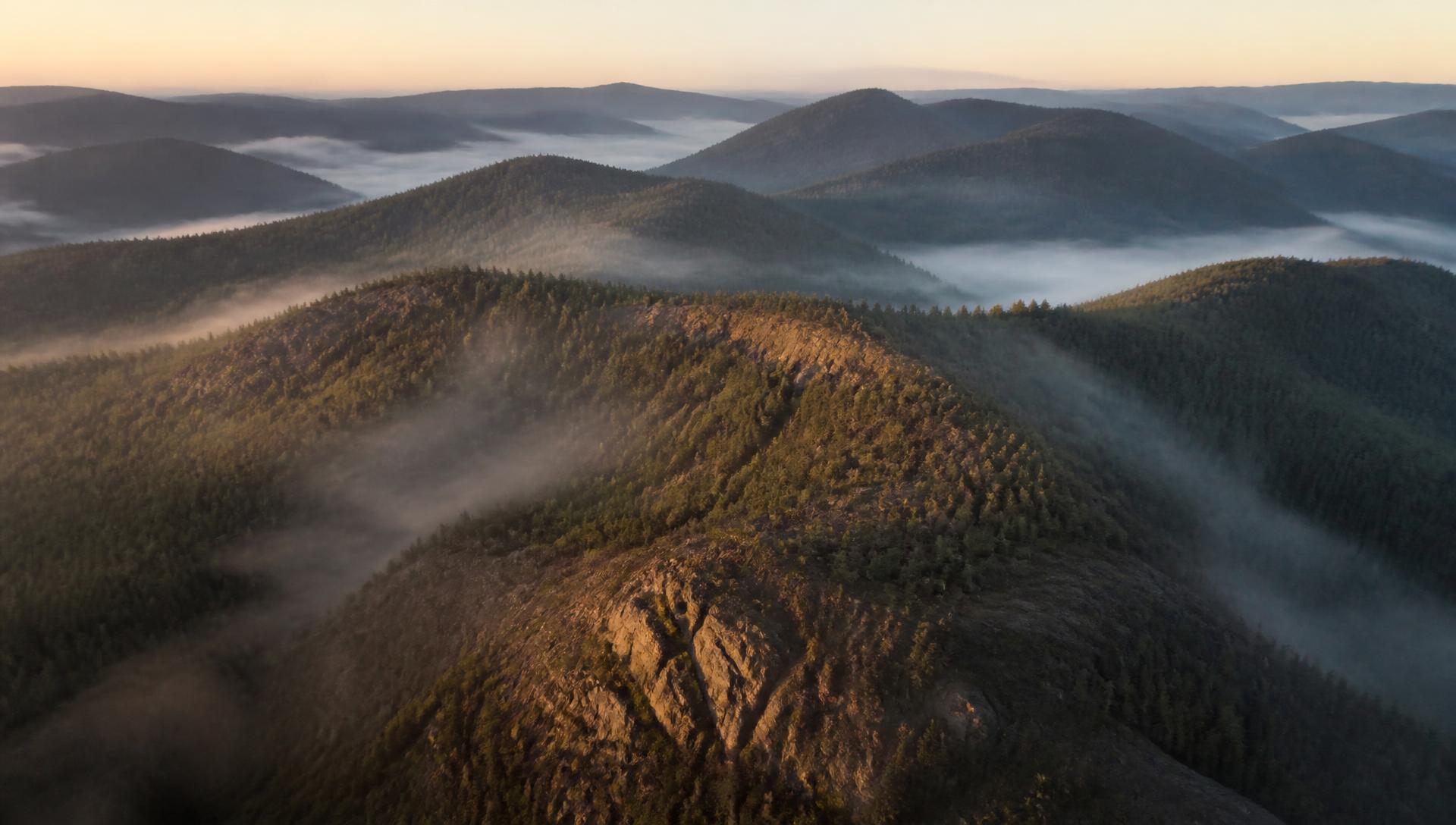 Forested mountain ridges near Republic, Washington at dawn